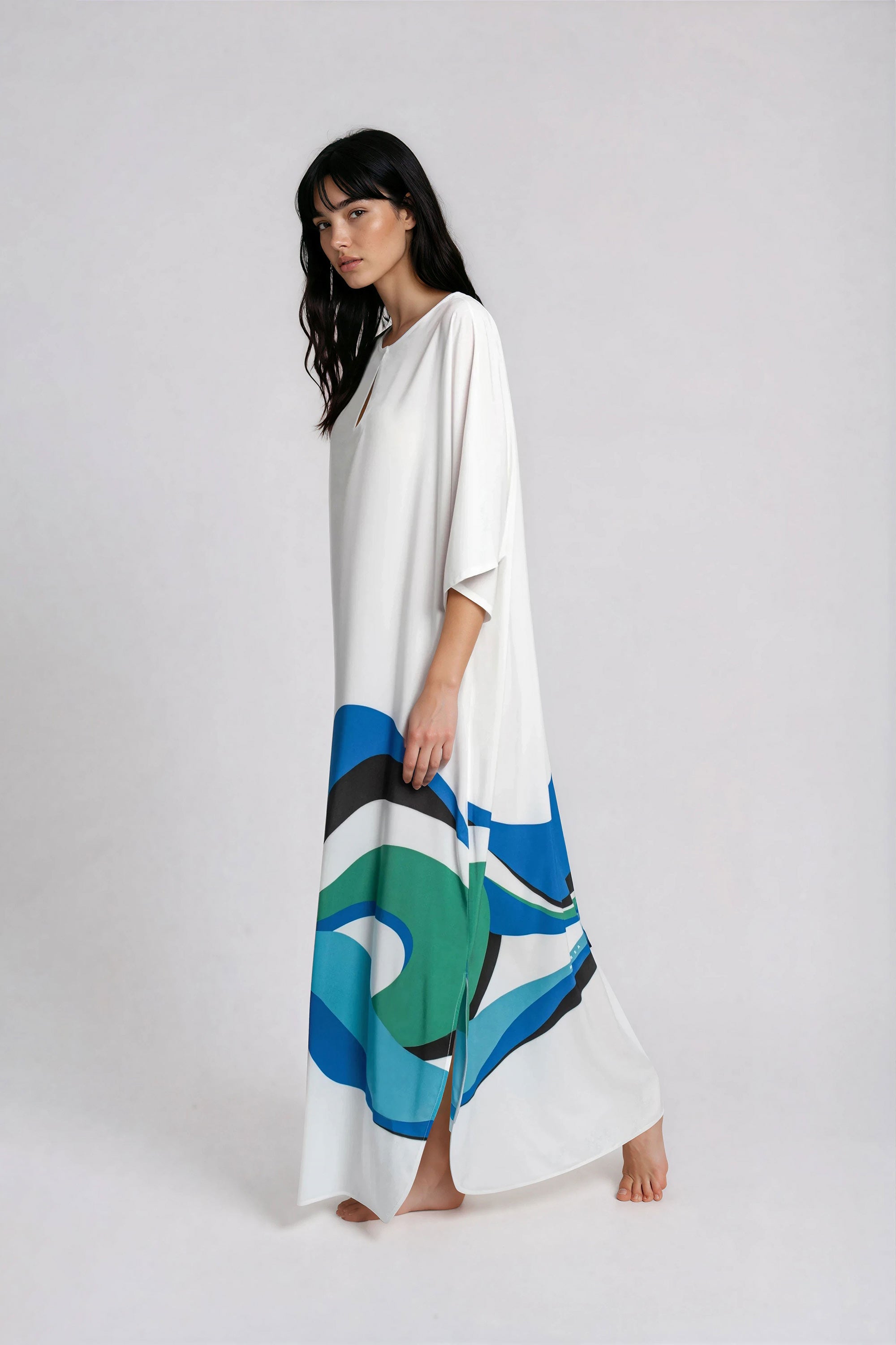 White maxi dress with abstract print left view